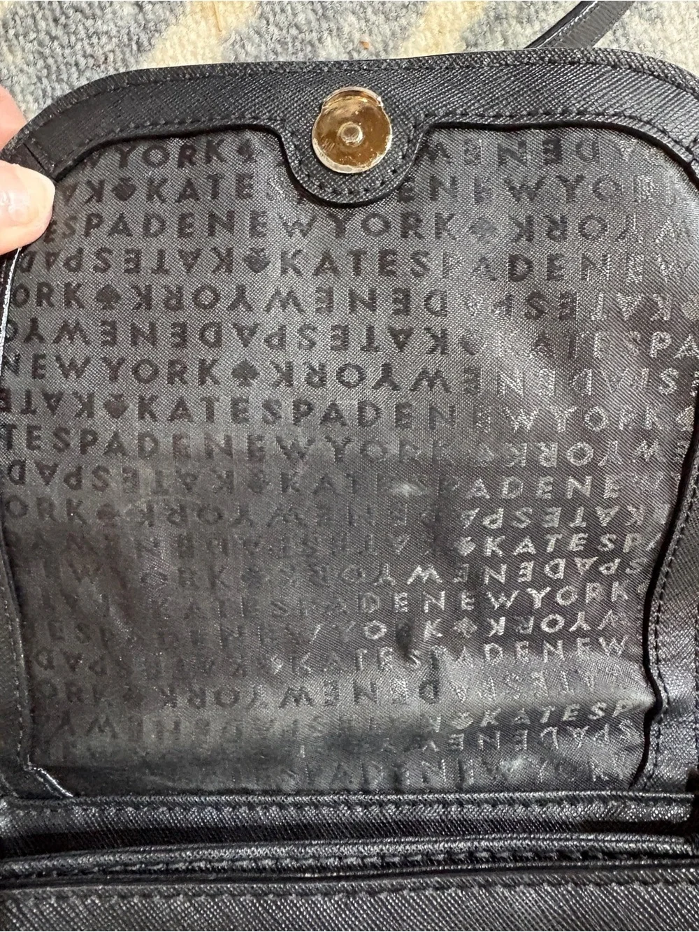 kate spade Black Textured Leather Crossbody with Gold Plaque
